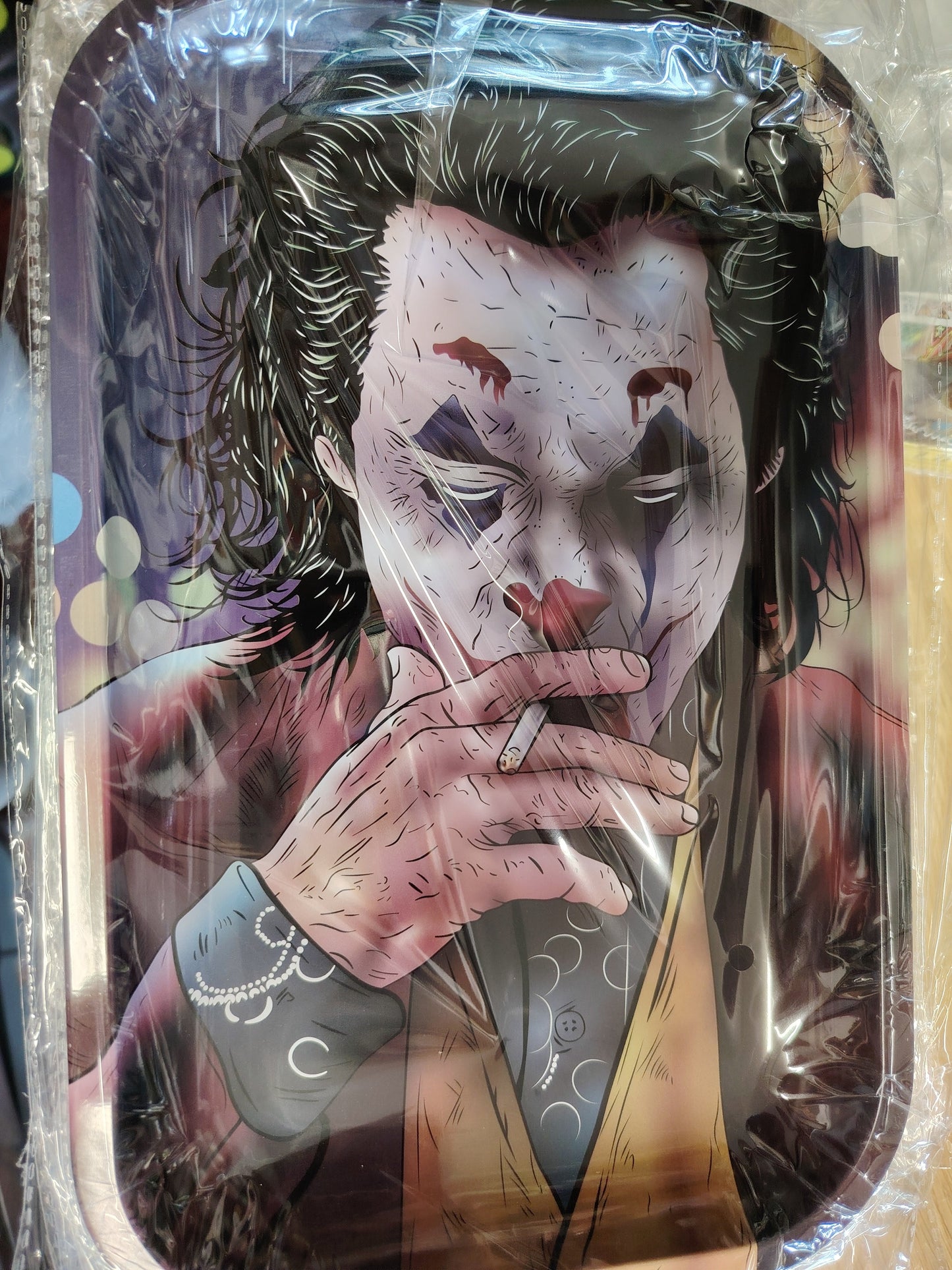 joker smoking on a metal tray 